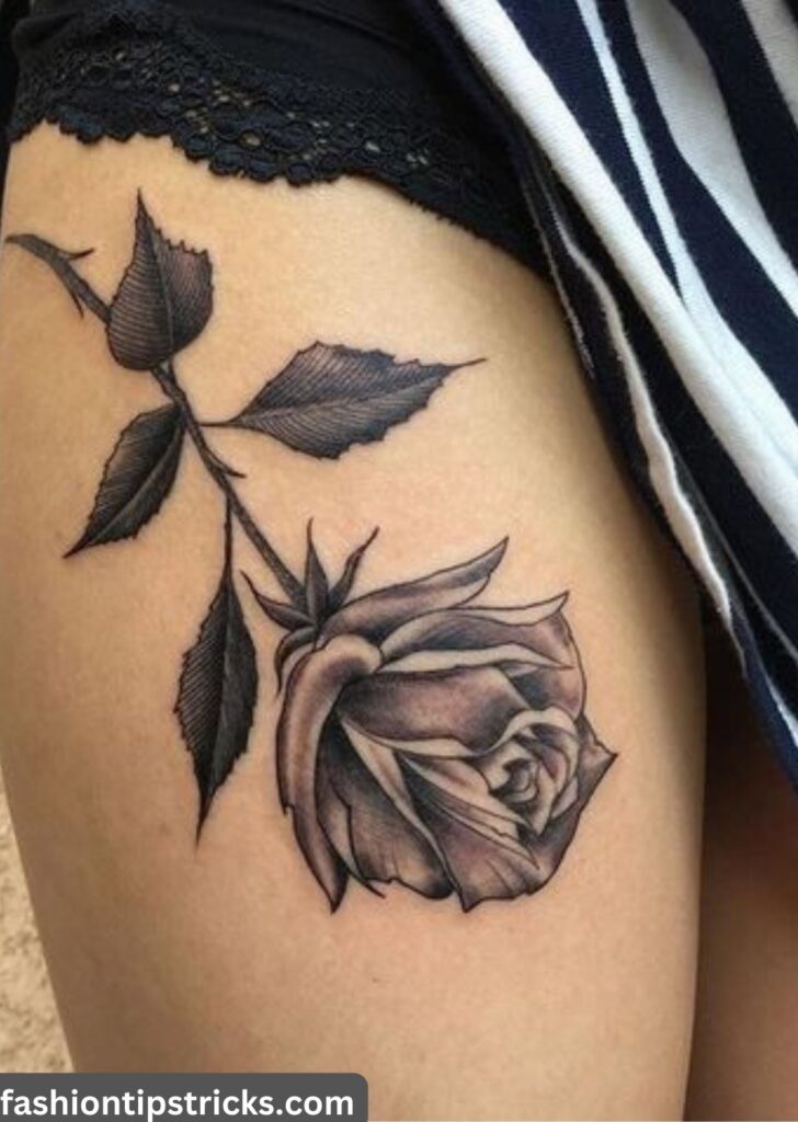 Single Flower Thigh Tattoo: Floral Sophistication